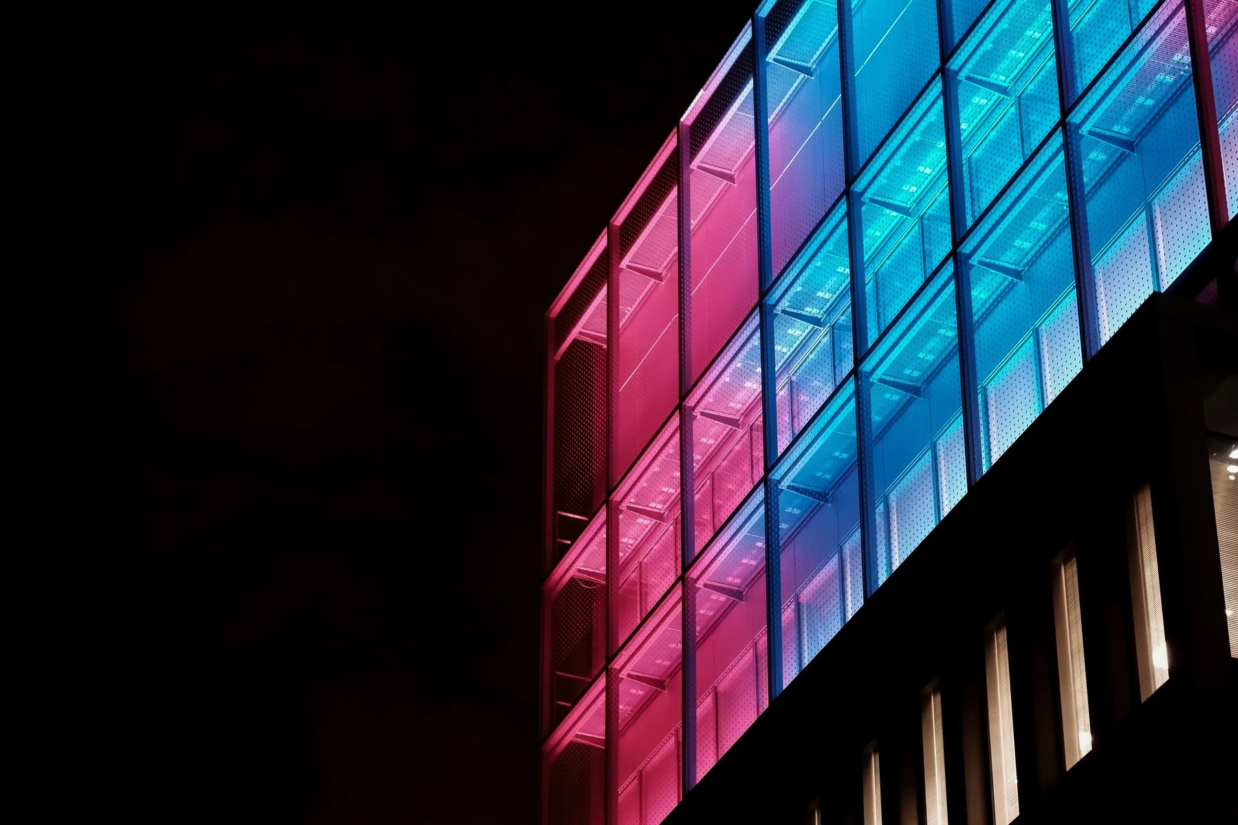 Architectural façade with coloured illumination